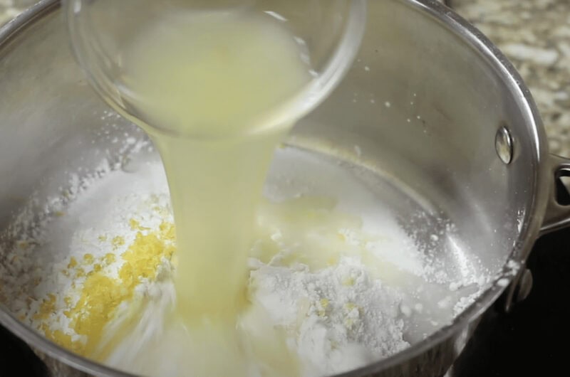 preparing filling for lemon meringue pie